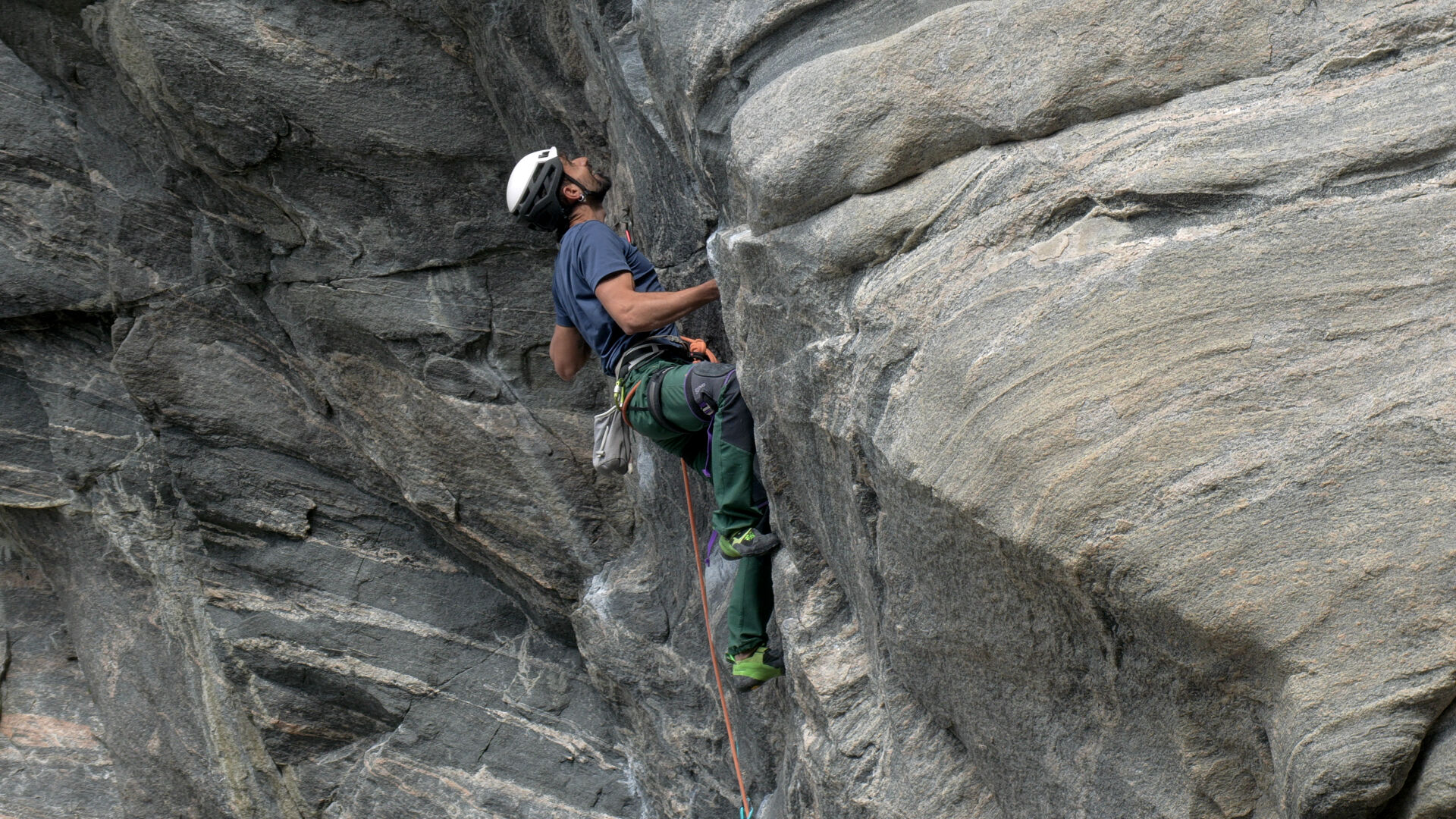 Climber bouldering outdoors